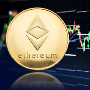Ethereum coin and stock chart at background